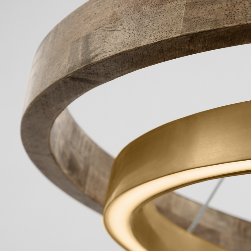 The Grace Chandelier by Sean Lavin is designed with two rings that illuminate this contemporary chandelier. A large outer ring provides organic texture while complemented by a decorative inner ring, housing gently diffused upward and downward LEDs.