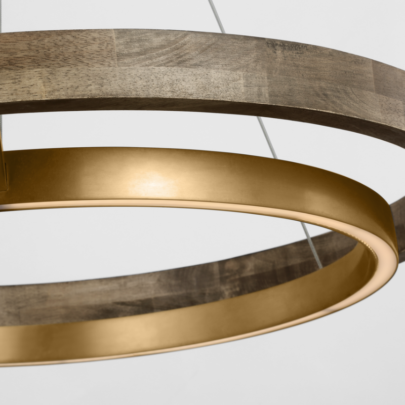 The Grace Chandelier by Sean Lavin is designed with two rings that illuminate this contemporary chandelier. A large outer ring provides organic texture while complemented by a decorative inner ring, housing gently diffused upward and downward LEDs.