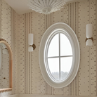 The Hampton Mini Chandelier from Visual Comfort and Co in plaster white in a bedroom