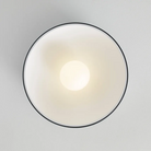 The Joni Flush Mount from Visual Comfort and Co in a lounge.