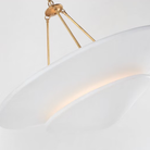 The Mollino Large Tiered Chandelier from Visual Comfort and Co in hand-rubbed antique brass from the side.