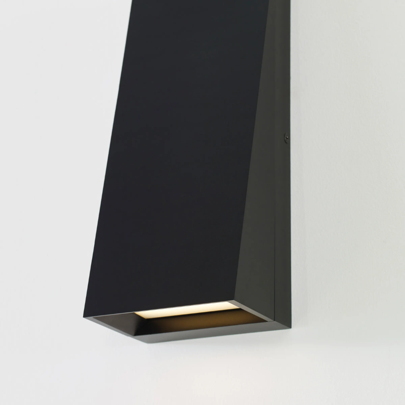 The Pitch Rectangular Outdoor Wall Sconce from Visual Comfort and Co in a close up shot of the LED light.