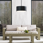 The Roton Outdoor Pendant from Visual Comfort and Co in an outdoor living area.