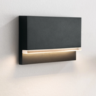 The Wend Outdoor Step Light from Visual Comfort and Co in a close up lifestyle photograph.