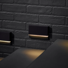 The Wend Outdoor Step Light from Visual Comfort and Co in a living area.