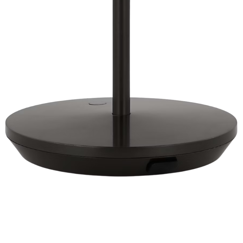 The Nevis Accent Rechargeable Table Lamp bronze from Visual Comfort Co with a close-up of the base.