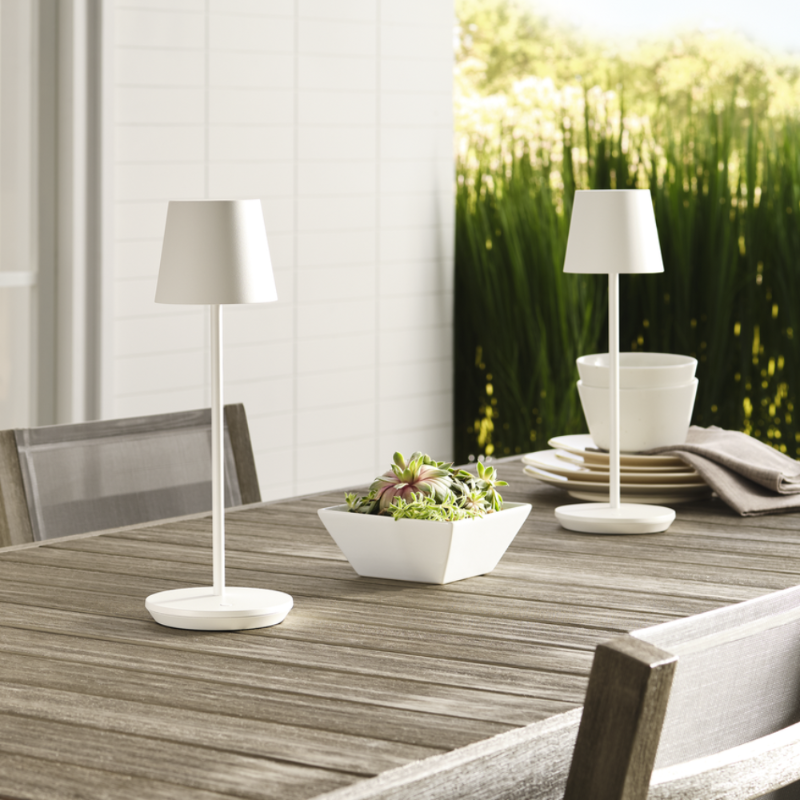 The Nevis Accent Rechargeable Table Lamp white from Visual Comfort Co in a dining room.