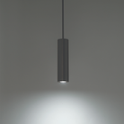 The black Caliber Mini Pendant from WAC Lighting in a studio.