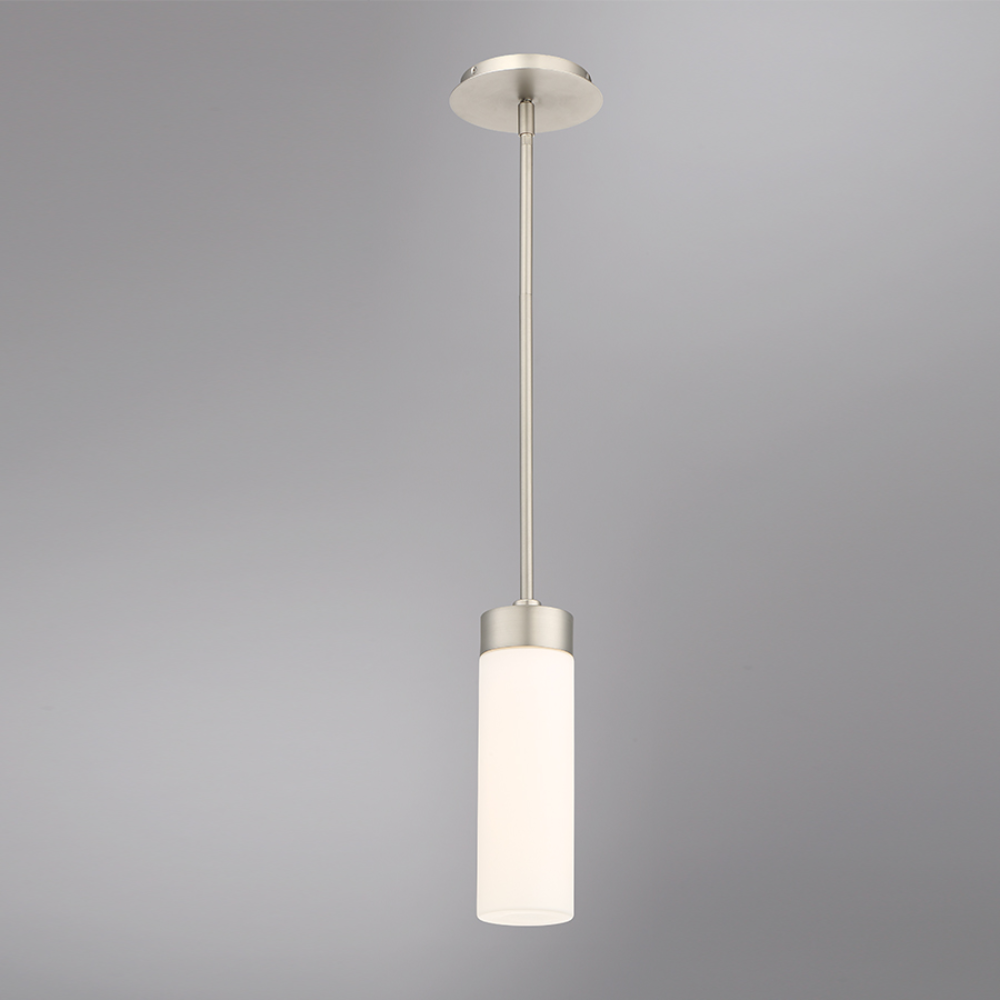 The 11 inch Elementum Mini Pendant from WAC lighting in a living room.