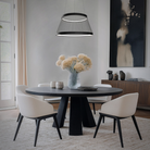 The Grohle Pendant by WAC Lighting over a dining table