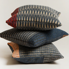 Three Cairngorm Shetland Tweed Cushions stacked.