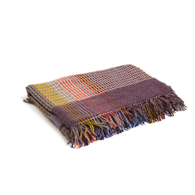 Woven on our multi-stripe warp, The Jankel Basket Throw ALT features a thoughtful palette of lavender purple, peach, and brown.