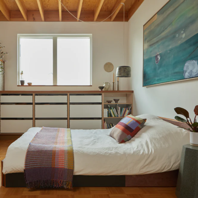 The Jankel Basket Throw ALT by Wallace & Sewell on a bed.