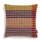 The Kew Cushion by Wallace and Sewell is made of natural shetland wool.   Pink and purple accents.