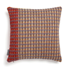 The Kew Cushion by Wallace and Sewell is made of natural shetland wool.   Red and purple accents.