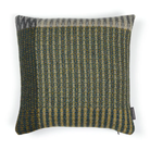 The Lismore Cushion by Wallace & Sewell features a blend vibrant green tones of shetland wool natural fibers.