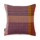 Wallace & Sewell’s Lovelace Basket Weave Cushion has colorful tones of red, yellow, purple, and brown.