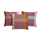 Wallace & Sewell’s Lovelace Basket Weave Cushion pairs warm red and orange tones with pink and mint accents in 100% merino lambswool.