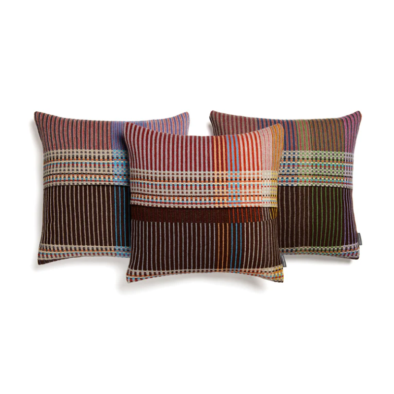Wallace & Sewell's Pinstripe Sophia cushions feature detailed vertical stripes within areas of bold playful color. 