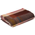 The Sophia Throw by Wallace & Sewell  is made of 100% Morino lambswool and features a contrasting palette of mahogany and a rich fuchsia. all-groups.