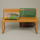 Wallace & Sewell’s Watson Throw and Cushion on a bench.
