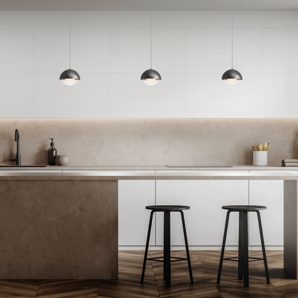 The Dome Mini Pendant from WAC Lighting in a kitchen and dining space.
