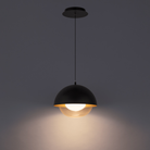 The Dome Mini Pendant from WAC Lighting in a living room.