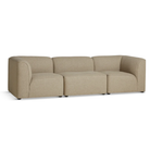 The Flora Sofa wide by Woud in warm beige.