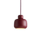 The small Stone Pendant from Woud in Deep Red.