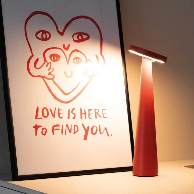 The red Angelina Pro from Zafferano in a home office.