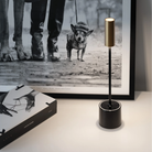 The jet black and brushed brass Carolina Pro from Zafferano in a primary bedroom.