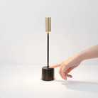 The jet black and brushed brass Carolina Pro from Zafferano in a studio lifestyle image.