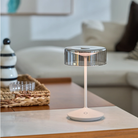 The white with smoke glass Crystal from Zafferano in a living room.