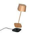 The rose gold Ofelia Pro cordless lamp from Zafferano, a portable light.