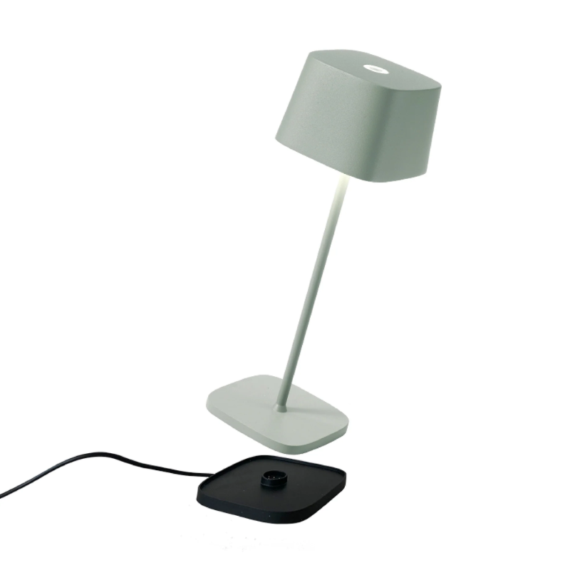 The sage Ofelia Pro cordless lamp from Zafferano, a portable light.