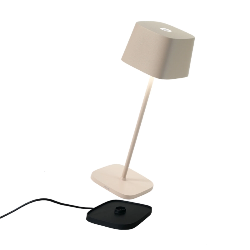 The sand Ofelia Pro cordless lamp from Zafferano, a portable light.