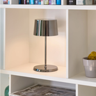 The black chrome Olivia Pro Mini from Zafferano in a family area.