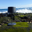 The dark gray Olivia Pro Mini from Zafferano oceanside.