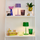 The green Olivia Pro Mini from Zafferano in a children's room.