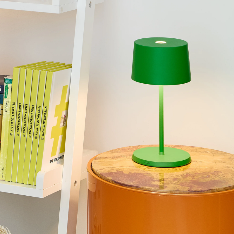 The green Olivia Pro Mini from Zafferano in a kid's room.