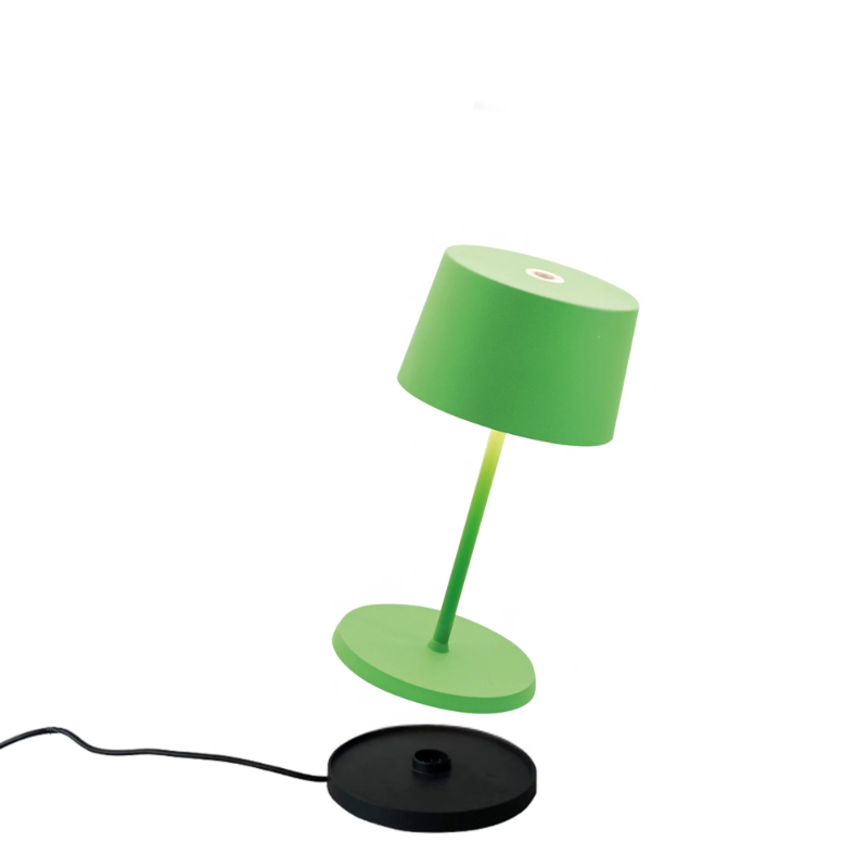 The green Olivia Pro Mini from Zafferano, a portable lamp.