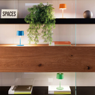 The orange Olivia Pro Mini from Zafferano in a home office.