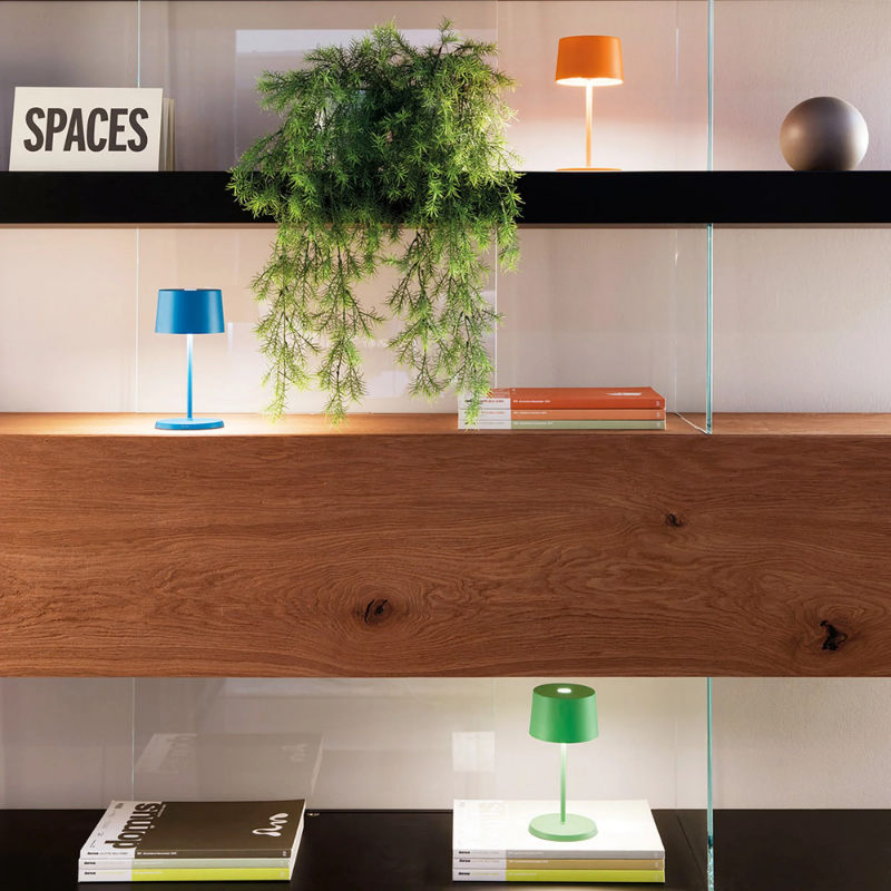 The orange Olivia Pro Mini from Zafferano in a home office.