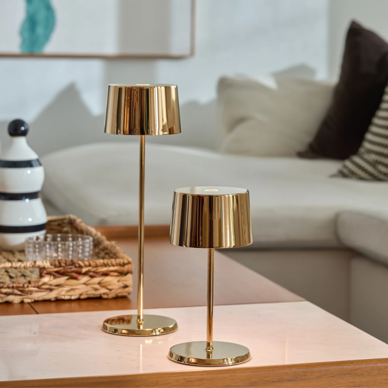 The rose gold Olivia Pro Mini from Zafferano in a living area.