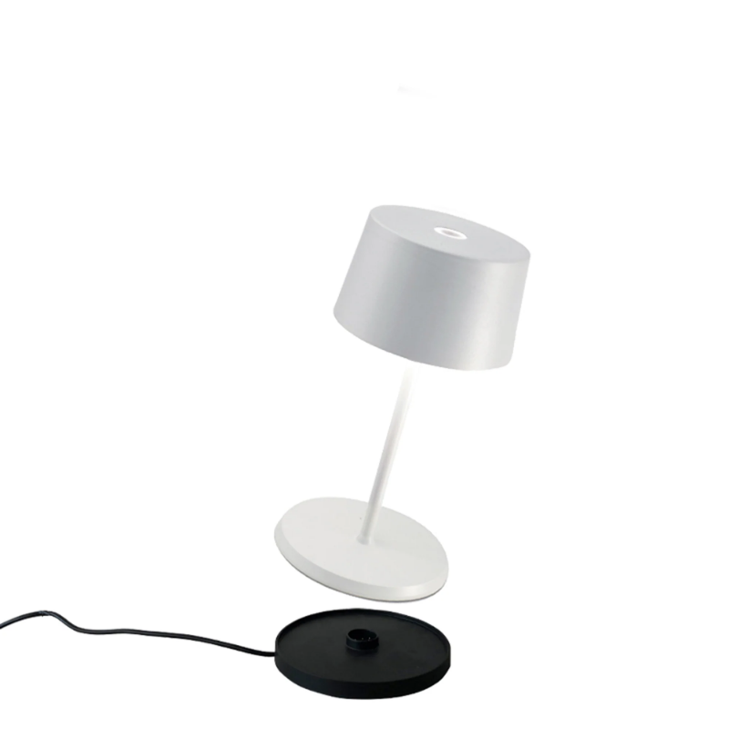 The white Olivia Pro Mini from Zafferano, a cordless lamp.