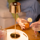 The rose gold Olivia Pro cordless lamp from Zafferano in a restaurant.