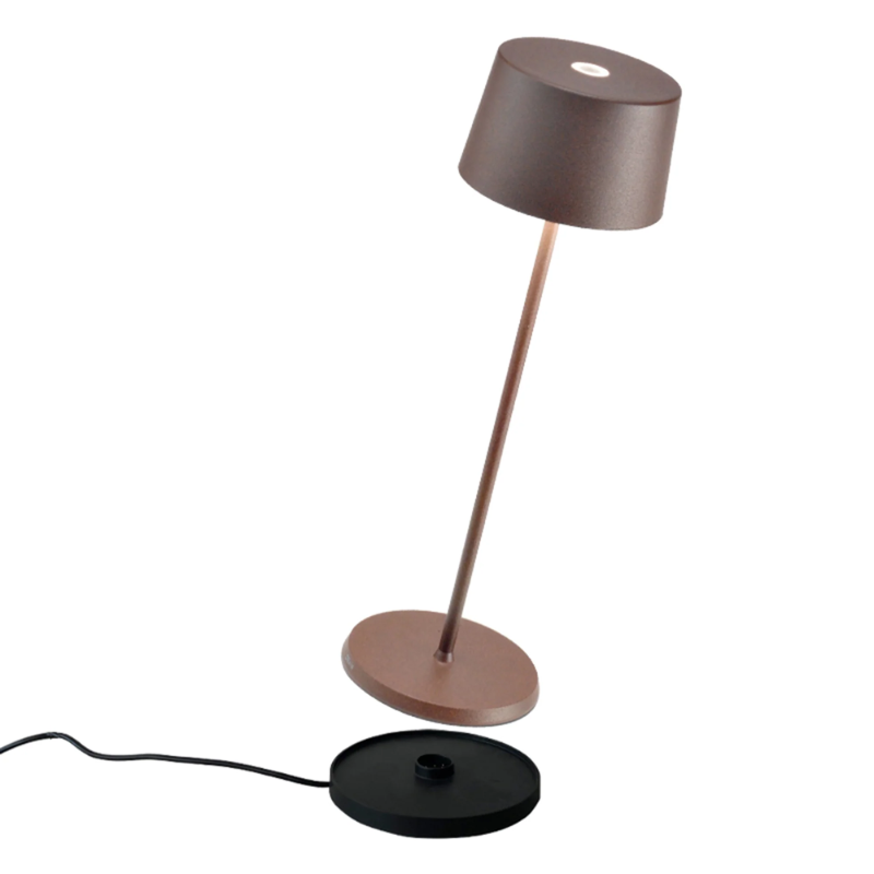 The rust Olivia Pro cordless lamp from Zafferano, a portable lamp.