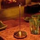 The glossy gold Pina Pro from Zafferano in a restaurant.