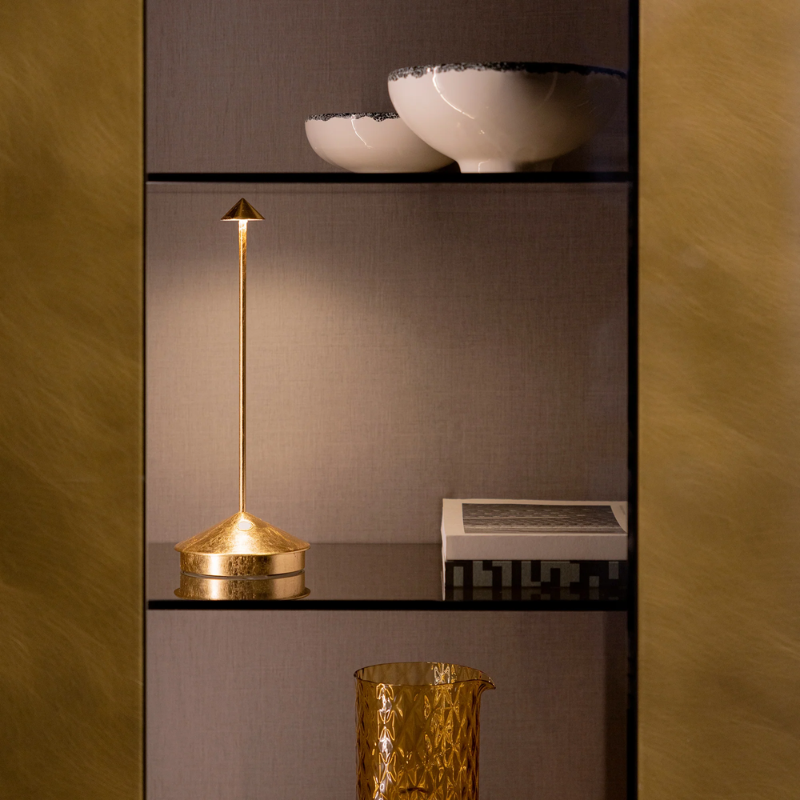 The gold leaf Pina Pro from Zafferano in a home library.