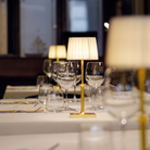 The matte gold Polinda Classic from Zafferano in a commercial cafe space.